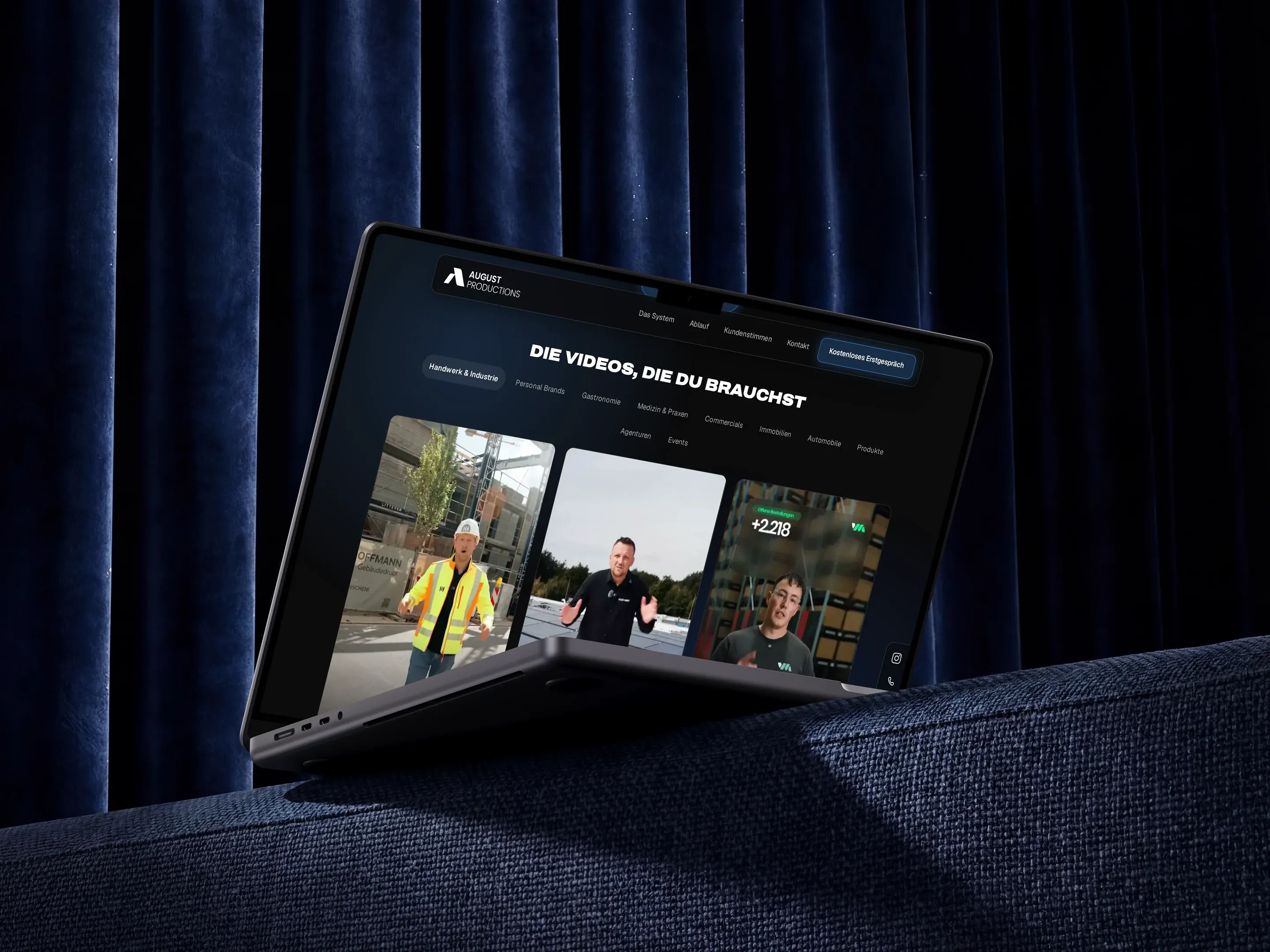 Website von August Productions auf einem MacBook